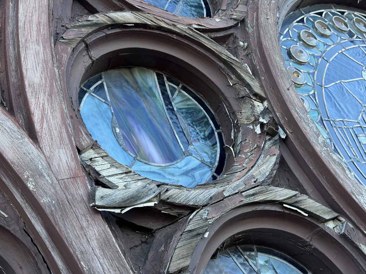 Close-up on damaged stained glass window